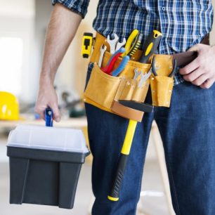 Professional Tools Used by Canadian Handyman Services Handyman tool belt with hanging tools for renovation work